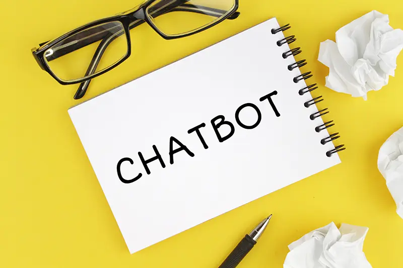 AI chatbot on a coaching website qualifying leads and booking clients 24/7
